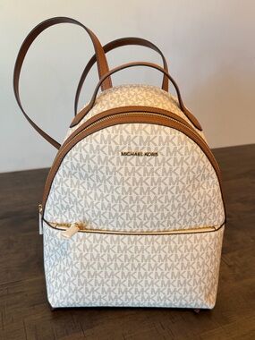 Michael Kors Cream Monogram Backpack with Brown Trim